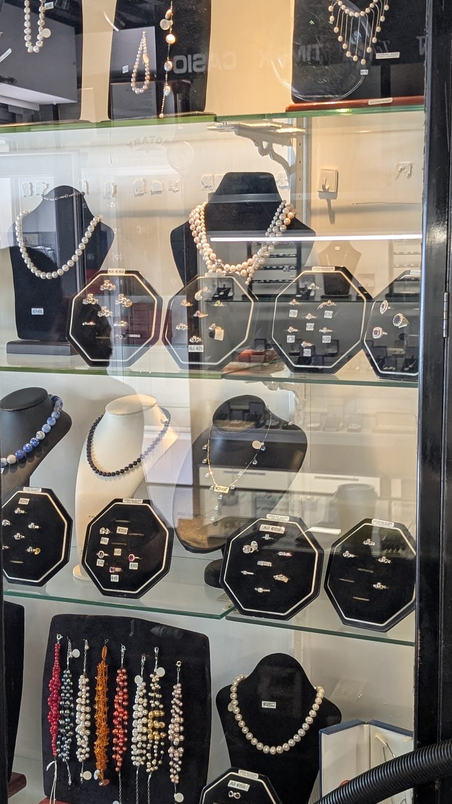 Display cabinet of rings and necklaces
